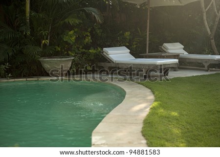Hotel garden and swimming pool in an exotic location.