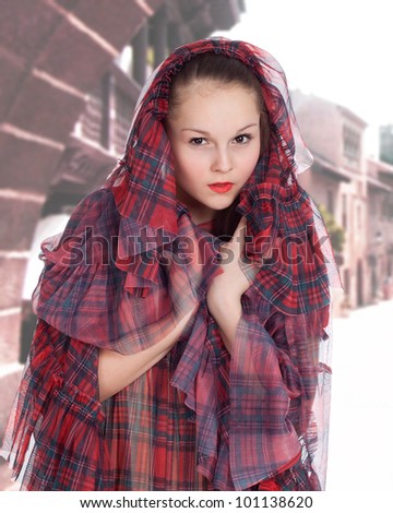 young woman in the hood in the old style, background, old, town