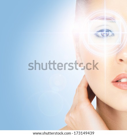 Hi-Tech Portrait Of Young And Attractive Woman With The Holographic Elements On Her Eyes (Laser Medicine And Security Concept)