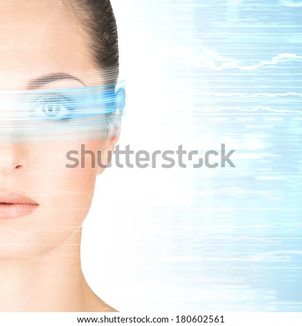 Young and attractive woman from future with the laser hologram on her eyes (eye scanning technology, optometry and virtual reality concept)