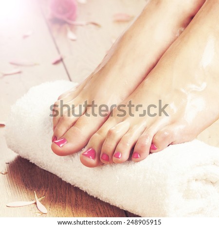 Legs and towel. Spa, recreation and skin care concept.