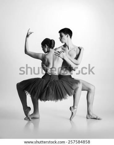 Couple of young and athletic ballet dancers