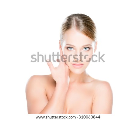 Beautiful young woman with smooth skin on isolated background.