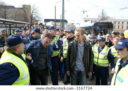 Police officers arrest people near Bronze Soldier in Tallinn Estonia  26.04.07