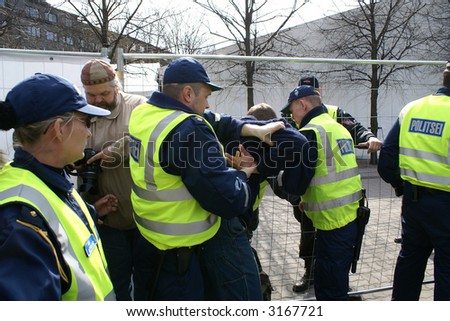 Police officers arrest people near Bronze Soldier in Tallinn Estonia  26.04.07