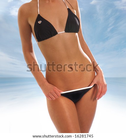 stock photo Sexy belly over resort background