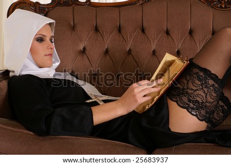 stock-photo-sexy-nun-reading-bible-25683937.jpg