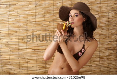 Sexy lady with the exotic cocktail