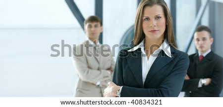 Business team over modern office background