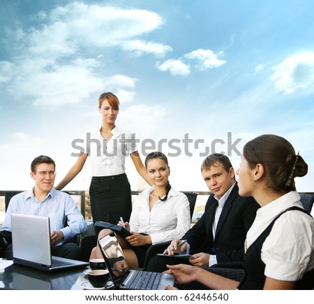 Group of some business people working in the open air office