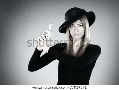 Young attractive killer widow over grey background