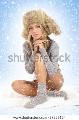 Attractive blond in a winter dress
