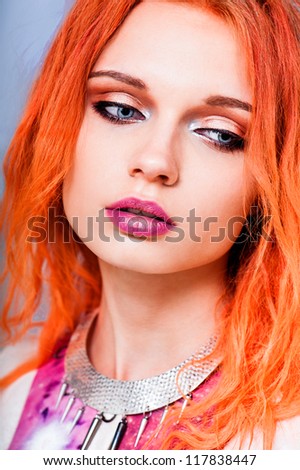 fashion model close-up face art women in white clothes portrait on color background long light color pink hair