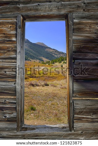 view of the valley from the door of the abandoned house in the ghost town of Colorado during fall