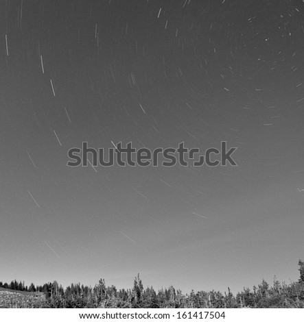star tracks in the night sky in black and white, north america