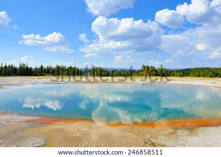 Midway Geyser Basin and reflection of clouds in Yellowstone National Park, Wyoming