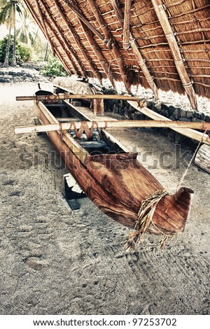 primitive wooden boat in a shelter in Hawaii, place of refuge