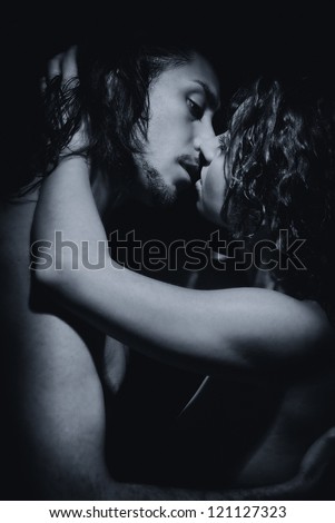 Black and white temptation woman and man, kissing