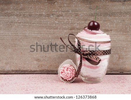 Romantic pink cupcake towel wedding give away.