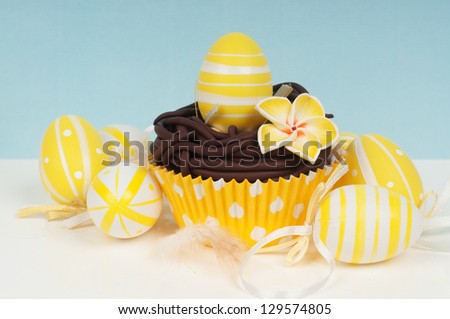 easter cupcake with decorated easter eggs ornaments