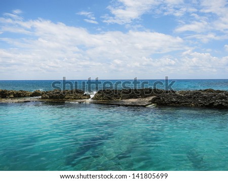 beautiful blue water with rocks in Mexico Yucatan