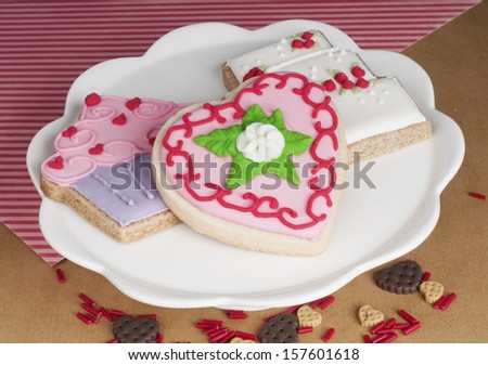 Decorated cookies on a cake stand