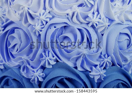 close up blue rosette cake texture