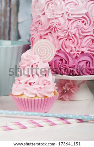 romantic pink cupcake and rosette cake for wedding