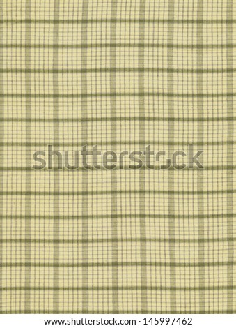 White green and grey plaid fabric swatch fabric background.