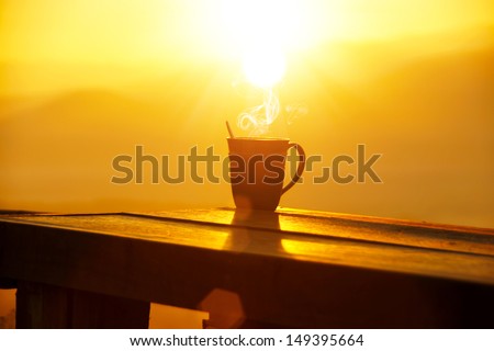 Silhouettes on sunrise morning coffee.