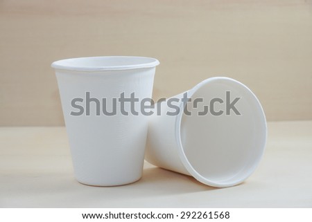 Paper food container on wood background
