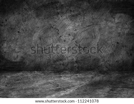 Grunge room interior with cement wall