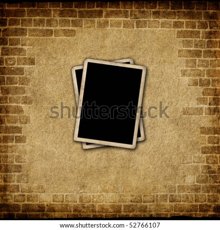 Blank photo frame on aged wallpaper