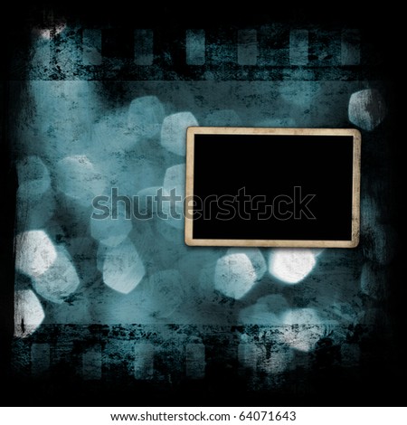 Vintage photo frame on abstract holiday lights background
