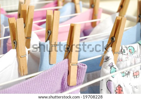 Baby clothes hanging to dry