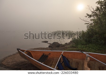 Lake Louisa of Algonquin Provincial Park in a foggy summer morning