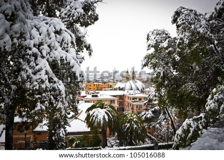 View of Rome from Villa Borghese gardens, Italy. The rare cold leaves the Italian city Rome blanketed with snow.