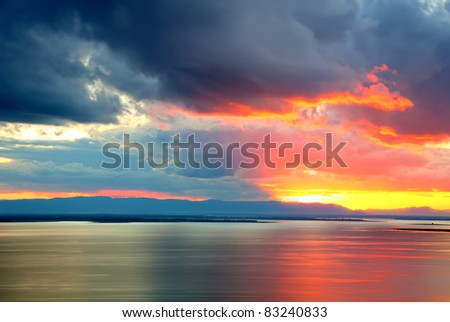 golden light after sunset with dark cloud sky (high dynamic range)