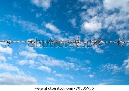 wire fence in the sky background