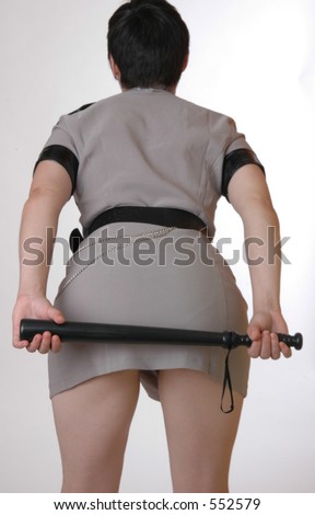 stock photo girl bent over with night stick
