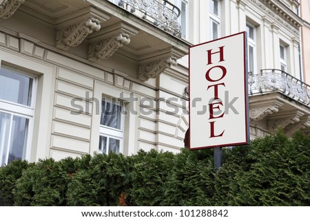 Hotel signboard before an entrance