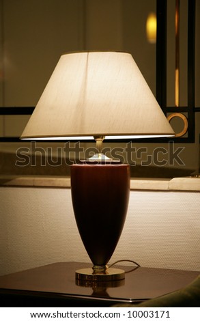 desk lamp shines a living room