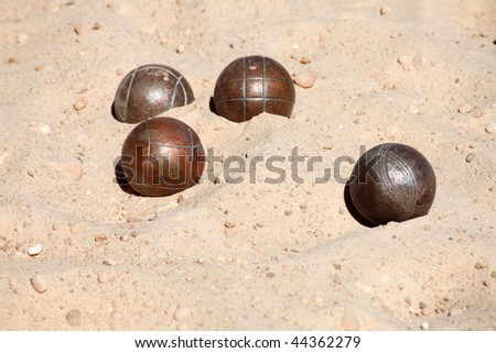 Metal spheres for game in boccia, on sand