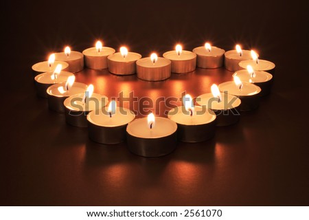 Candle heart with flames pointing inward.