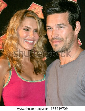HOLLYWOOD - MAY 13: Eddie Cibrian and wife participate in \