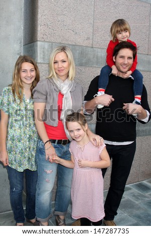 Jennie Garth, Peter Facinelli, and daughters attends the Milk And Bookies First Annual Story Time Celebration at Skirball Cultural Center Los Angeles, CA February 28, 2010