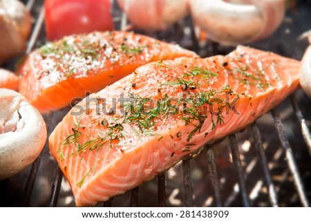 Salmon fillets in a ball grill