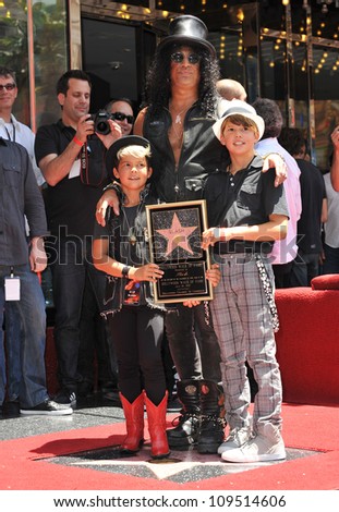 Rock guitarist Slash & sons on Hollywood Blvd where he was honored with a star on the Hollywood Walk of Fame. July 10, 2012  Los Angeles, CA Picture: Paul Smith / Featureflash