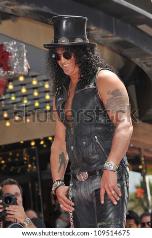 Rock guitarist Slash on Hollywood Blvd where he was honored with a star on the Hollywood Walk of Fame. July 10, 2012  Los Angeles, CA Picture: Paul Smith / Featureflash