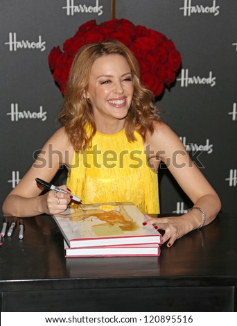 Kylie Minogue signs copies of her book Kylie/Fashion at Harrods London, England. 28/11/2012 Picture by: Henry Harris